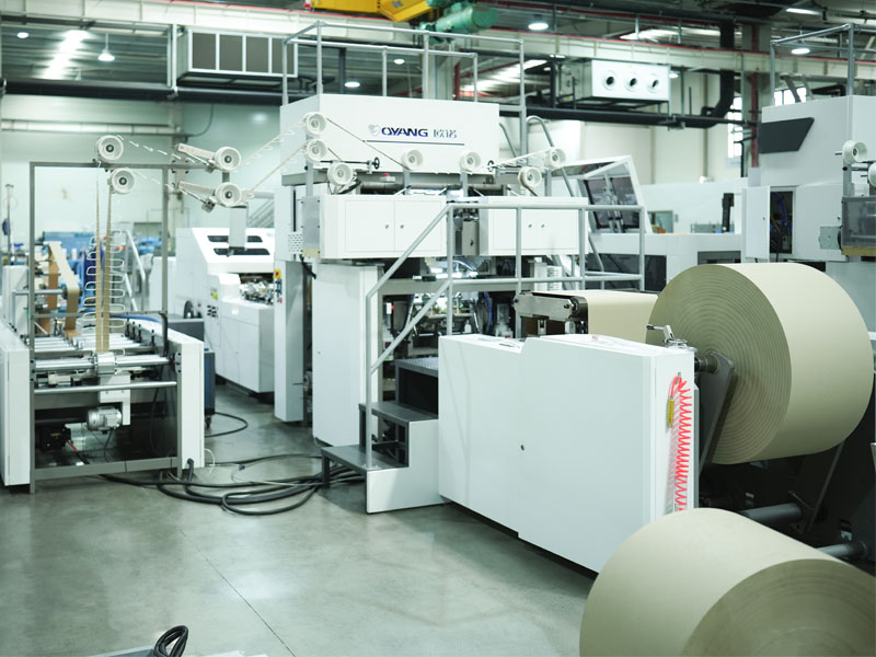 OYANG Machinery A Serisi Bükülmüş Saplı Kare Altlı Kağıt Torba Makinesi Online